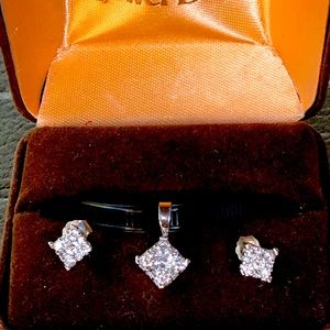 1 Carat TW  set in 10K gold DIAMOND PENDANT AND EARRINGS.